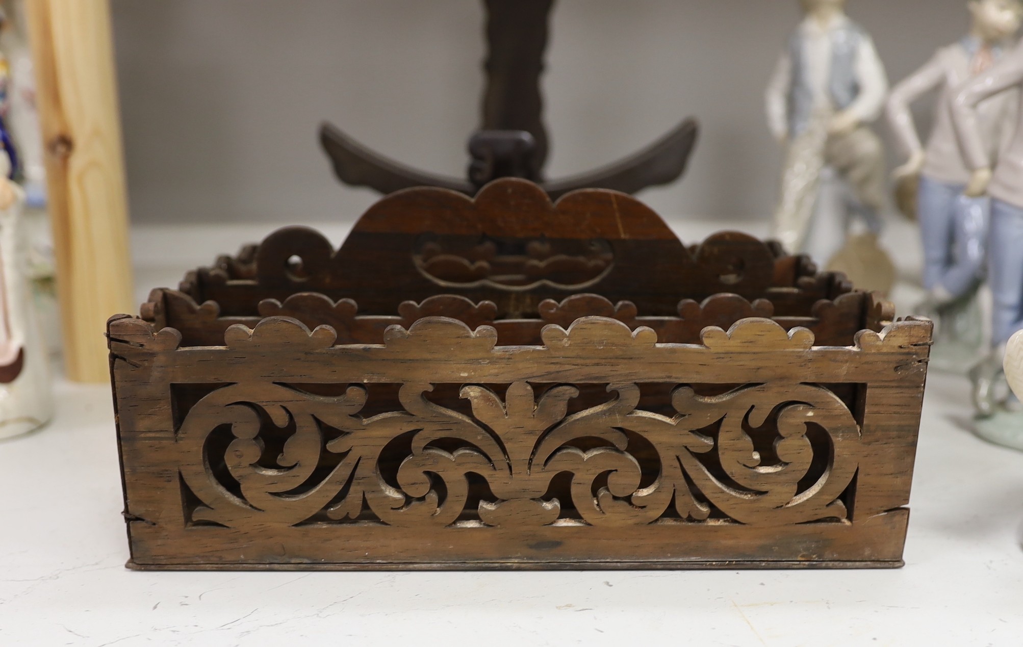 Two Chinese hardwood plate stands and a fret cut rosewood letter rack, 26cm wide